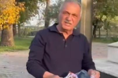 Şehitliğe saygısızlık yapanlara tepki gösterdi, çöpleri tek tek topladı