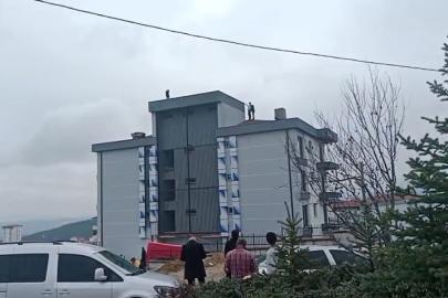 Çalıştığı firmadan alacağını alamadığını iddia eden işçi çatıya çıktı