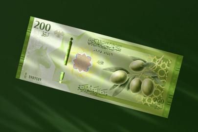 Suriye'de yeni banknotlar tanıtıldı. Esad'ın portreleri kaldırıldı