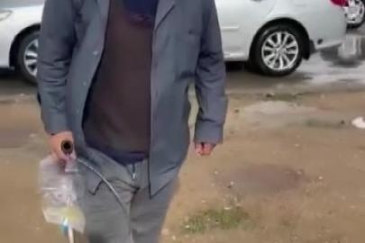 Sonda tüpüne meyve suyu koyup dilencilik yapan şahıs yakalandı